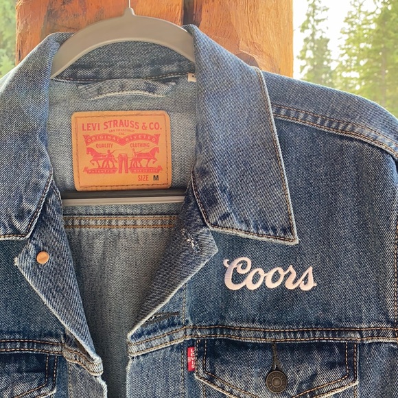 Levi’s jean jacket with “Coors” white embroidery